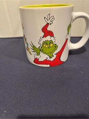 Bioworld White Mug with Green Grinch Illustration and Yellow Interior